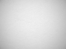 Seamless texture of white cement wall a rough surface, with space for text, for a background... photo