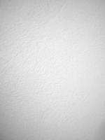 Seamless texture of white cement wall a rough surface, with space for text, for a background... photo