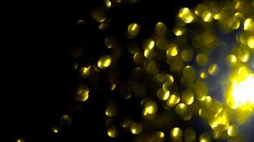 de rörelse av de guld bokeh lampor för jul, dans fest ,abstrakt glöd rörelse bakgrund