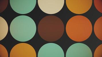 Trendy retro 1970s geometric background with colorful blinking circles in warm color tones. This stylish vintage motion background animation is 4K and a seamless loop. video