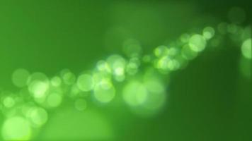 desfocado verde bokeh luzes fundo. isto elegante movimento animação com esfera bokeh partículas é cheio hd e uma desatado laço. adequado Como a abstrato st patrick's dia fundo. video