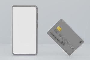 Mockup smartphone and bank credit card on gray background photo