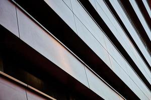 Modern building facade with geometric pattern photo