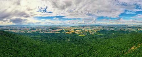 Aerial view of agricultural and green fields in countryside photo