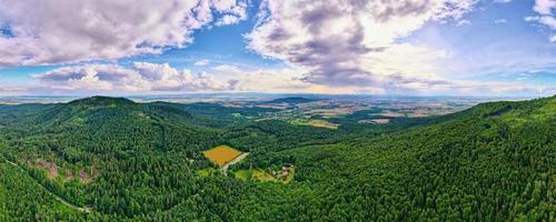 Aerial view of agricultural and green fields in countryside photo