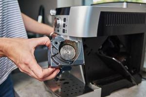 Automatic coffee machine maintenance photo