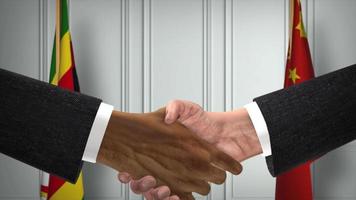 Zimbabwe and China Officials Business Meeting. Diplomacy Deal Animation. Partners Handshake 4K video