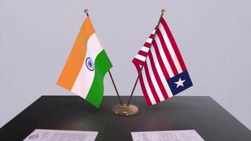 Liberia and India national flags. Partnership deal animation, politics and business agreement cooperation video