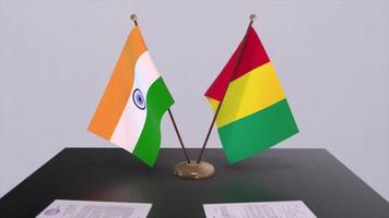 Guinea and India national flags. Partnership deal animation, politics and business agreement cooperation video