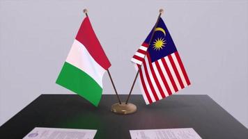 Malaysia e Italia nazione bandiere animazione. politica e attività commerciale affare o accordo video