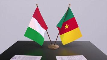 Cameroon and Italy country flags animation. Politics and business deal or agreement video