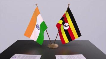 Oeganda en Indië nationaal vlaggen. vennootschap transactie animatie, politiek en bedrijf overeenkomst samenwerking video