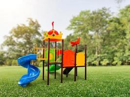 Slides, colorful rides for children in the park, children's corner photo