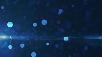 abstract achtergrond van blauw gloeiend deeltjes en bokeh dots van feestelijk energie magie, video 4k, 60 fps