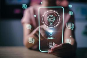 Chatbot Chat with AI, Artificial Intelligence. man using technology smart robot AI, artificial intelligence by enter command prompt for generates something, Futuristic technology transformation. photo