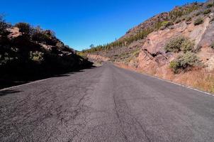 Road through the scenic landscape photo