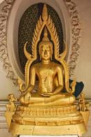 Golden Buddhist statue photo