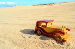 Toy car in the sand photo