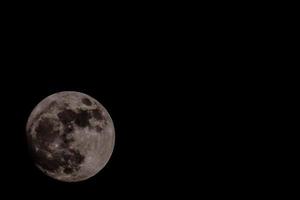 Moon on night sky photo
