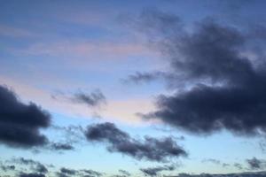 Colourful cloudy twilight beautiful sky cityscape sunset and morning sunrise. Dramatic evening night early morning view. Panoramic nature background concept. Copy space for text. World environment day photo