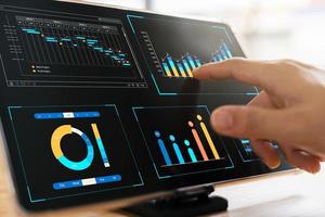 businessman analyzing business Enterprise data management, business analytics with charts, metrics and KPIs to improve organizational performance, marketing, financial organization strategy. photo