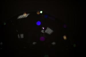 Reflection in dark. Ball will reflect lights. Transparent surface on dark background. Rubber material. photo