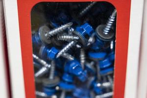 Blue roofing self-tapping screws, color hat with a rubber lining, roofing self-tapping drill photo