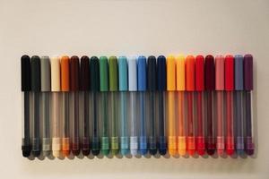 a set of many colored markers, a set for drawing photo