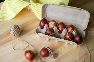 Painted eggs cooked for Easter are in an eco-friendly tray. drawings on easter eggs photo