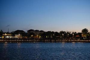 Deep blue water of Harbour Bridge at sunset photo