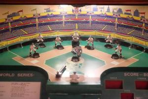 Baseball game console in the playground photo