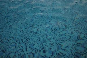 Blue mosaic tiled swimming pool photo