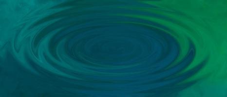 Water ripples, Motion illustration. Abstract fractal blue green background with crossing circles and ovals. Concentric Circles Forming In Still Water. Water surface with ripples and sunrays reflection photo
