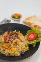 Fried rice sambal matah with crackers serving photo