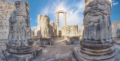 Panorama of Temple of Apollo in ancient city of Didim under the blue cloudy sky photo