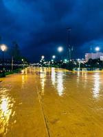 Majestic wet public park with breathtaking scenery, perfect for a peaceful and introspective stroll photo