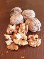 Discover the beauty of whole and shelled walnuts photo