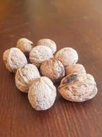 Discover the beauty of whole and unpeeled walnuts photo