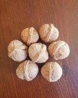 Nature treasures the mesmerizing scenery of unpeeled walnuts photo