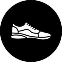 icono de vector de zapatos