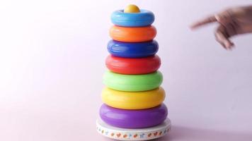 Baby toys on color background. Child development concept video