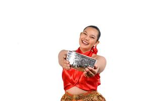 Portrait beautiful woman in Songkran festival with water bowl photo