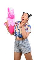 Portrait smiley woman in Songkran festival with water gun photo