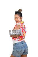 Portrait pretty woman in Songkran festival with water bowl photo