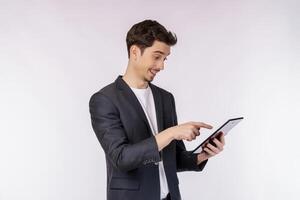 Portrait of attractive cheerful businessman using device app searching web isolated over white color background photo