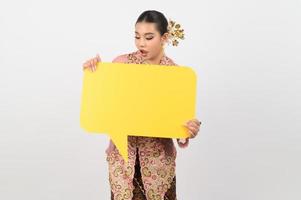 Young beautiful woman dress up in local culture in southern region with speech bubble photo