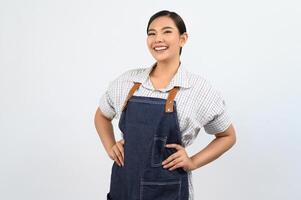 Portrait Asian young woman smile with happy in waitress unifrom photo