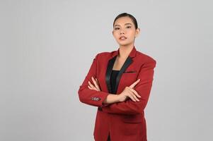 Young beautiful woman in formal clothing for officer on white background photo