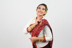 Portrait of Beautiful Thai Woman in Traditional Clothing standing Posing photo