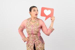 Young beautiful woman dress up in local culture in southern region with speech bubble photo